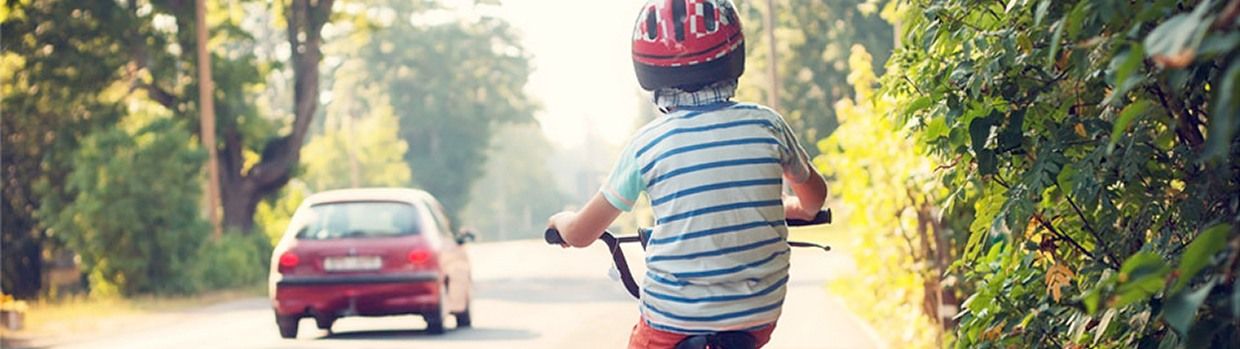 Bandeau de la page 'À vélo, le casque est obligatoire pour les enfants de moins de 12 ans